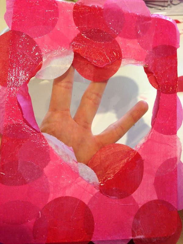 Wood heart frame completely covered in tissue paper dots