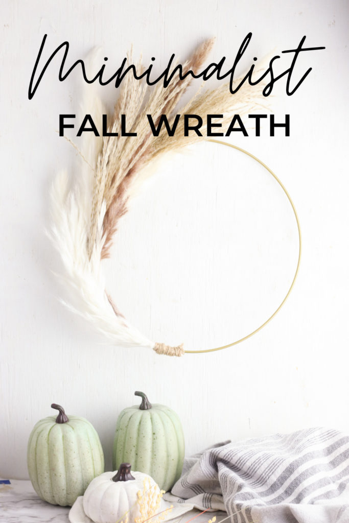 Pampas grass hoop wreath with textual overlay.