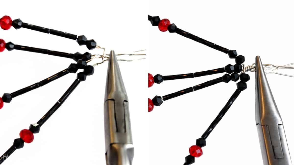 Close-up of pliers twisting multiple beaded wires together to form legs for a handmade spider craft or jewelry project.
