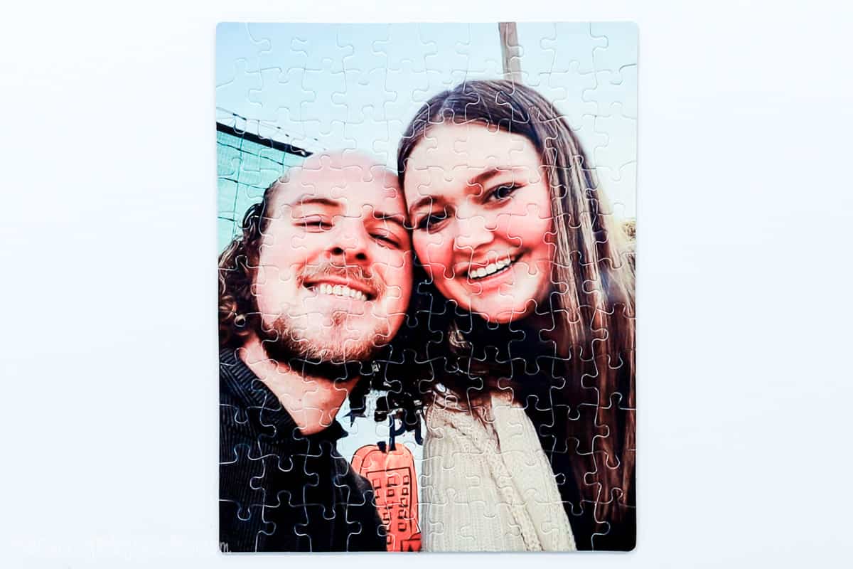 Completed custom photo puzzle of a girl and a boy.