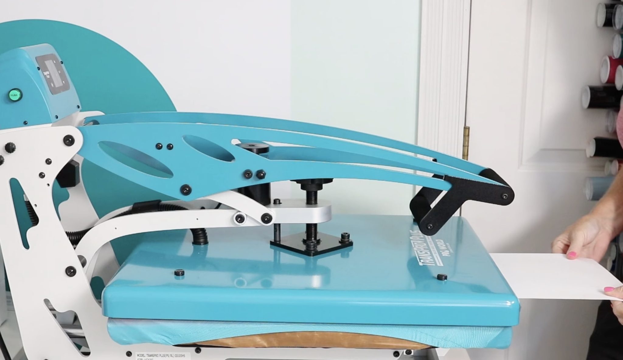 Close heat press with significant pressure.